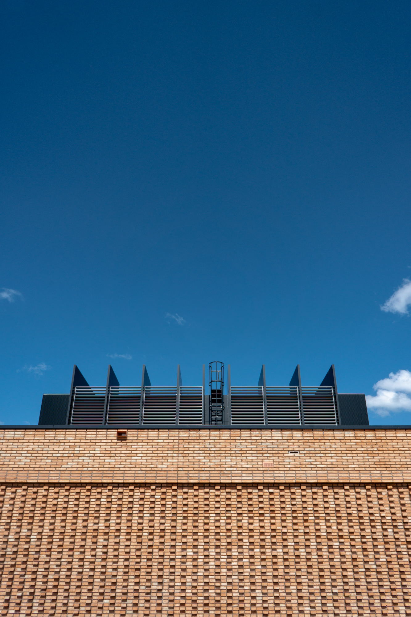 Substation in Orange Brick from Waste at Amsterdam IJburg || StoneCycling