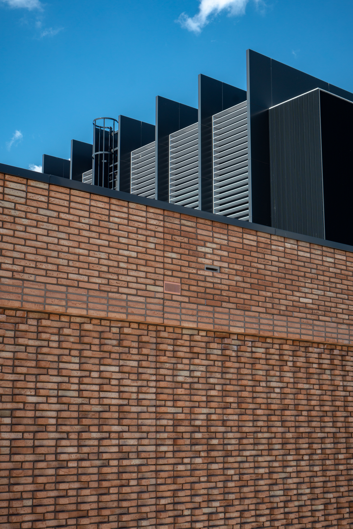 Substation in Orange Brick from Waste at Amsterdam IJburg || StoneCycling