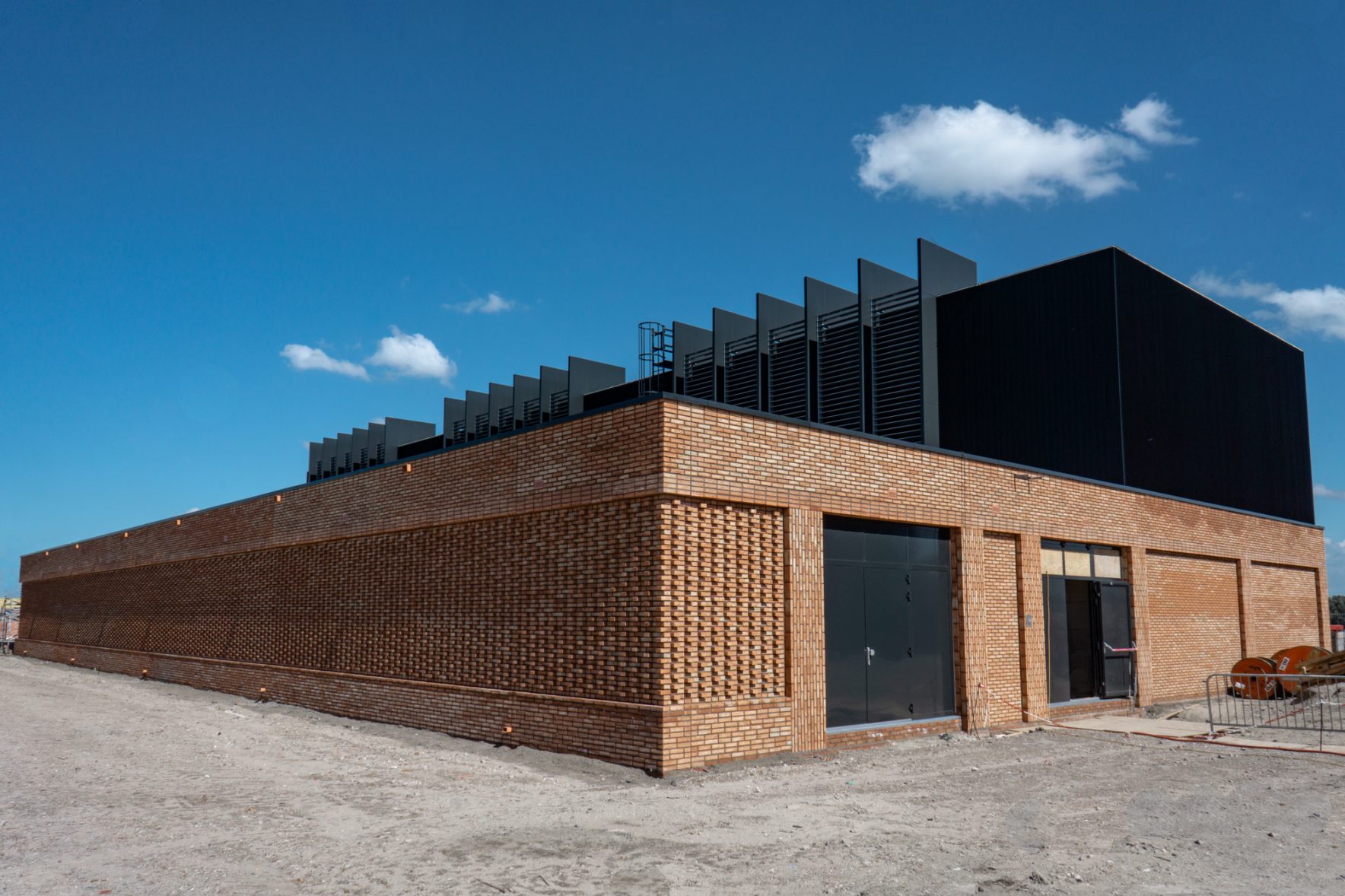Substation in Orange Brick from Waste at Amsterdam IJburg || StoneCycling