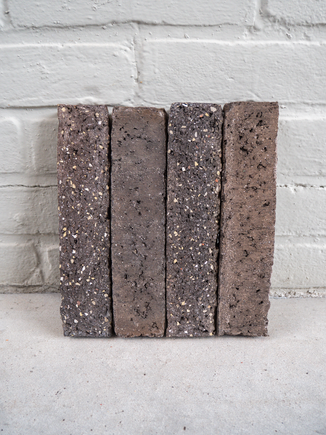 FRONT Materials - WasteBasedSlips Blackpepper Punched & Sliced