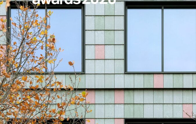 Facade clad in green and pink Basic Third tiles made from recycled PVC by Pretty Plastic, with the Dezeen Awards 2026 shortlisted logo